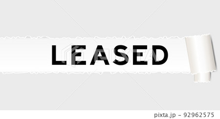 Ripped gray paper background that have word leased under torn part 92962575
