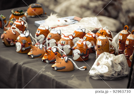 Toy figurines in a row Toy figurines in a row 92963730