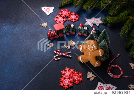 Christmas homemade gingerbread cookies on a dark concrete table table 92965984