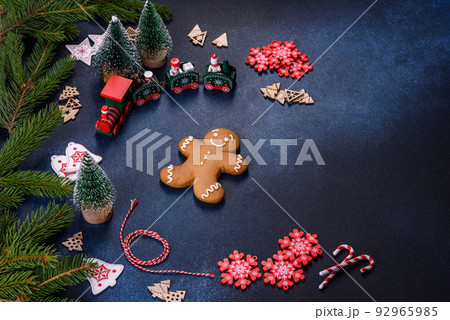 Christmas homemade gingerbread cookies on a dark concrete table table 92965985