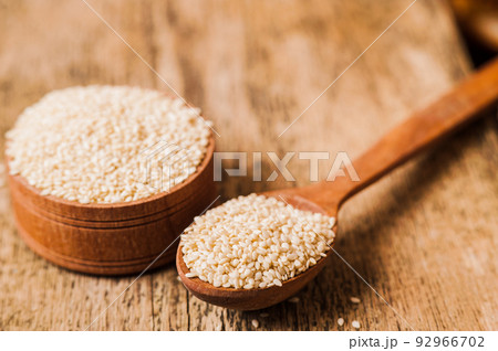 seeds sesame on wooden spoon seeds sesame on wooden spoon 92966702