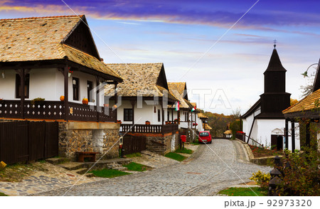 View of Holloko with wooden church 92973320