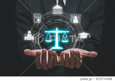 Justice and law concept, Man hand holding VR screen law icon background. Justice and law concept, Man hand holding VR screen law icon background. 92974488