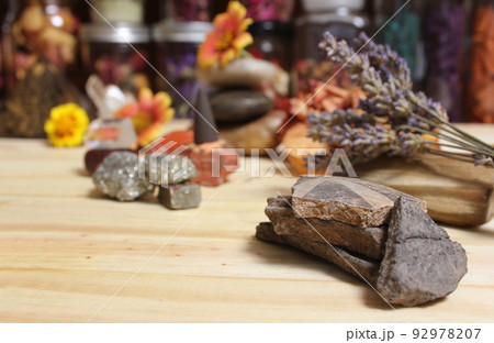 Ancient Native American Pottery Pieces With Crystals and Flowers on Meditation Table Ancient Native American Pottery Pieces With Crystals and Flowers on Meditation Table 92978207