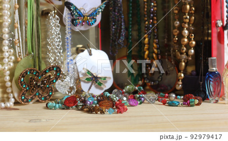 Vintage Jewelry in Jewelry Box Made From Vintage Candy Tin and Magnetic Hooks, Close up 92979417