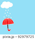 Red umbrella, clouds and rain in the blue sky background 92979725