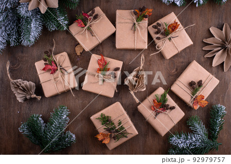 Christmas gift boxes in craft paper 92979757