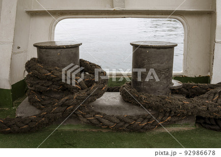 Montenegro - May 7, 2022 - Thick ship ropes on ferry 92986678
