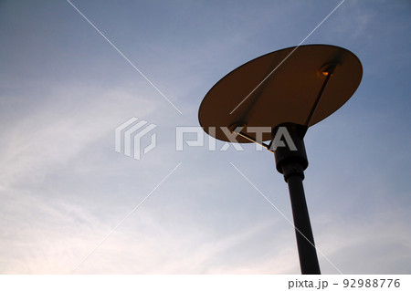 The design lamp and the empty blue sky 92988776