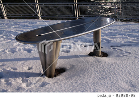 The metallic fishing table on the cold white snow The metallic fishing table on the cold white snow 92988798