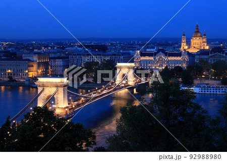 Chain Bridge and Church in Budapest illuminated in a spectacular night Chain Bridge and Church in Budapest illuminated in a spectacular night 92988980