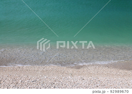 The turquoise water on the white stones of the Conero beaches The turquoise water on the white stones of the Conero beaches 92989670
