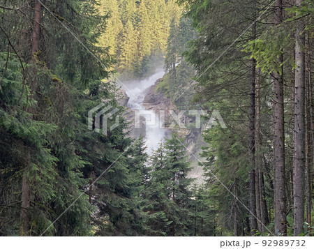 The impressive water jump of Krimml falls 92989732