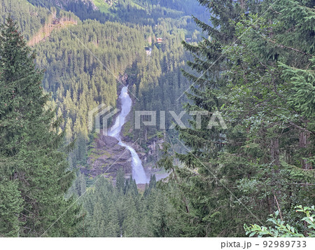 The impressive water jump of Krimml falls in Austria 92989733