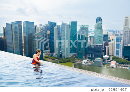 Kids swim in Singapore roof top swimming pool Kids swim in Singapore roof top swimming pool 92994497
