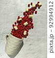 Red currant and raspberries with white chocolate on white background. 92994912
