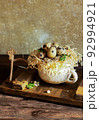 Quail eggs on a wooden table. Rustic style photography in daylight. 92994921