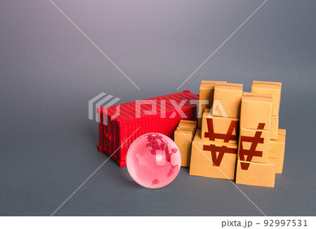 Boxes of goods and south korean won symbol. Production, warehousing storage and shipping logistics worldwide. Manufacture freight and sale of products. Business globalization. World trade economy. 92997531