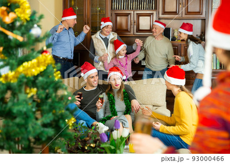 Family having fun on new year evening 93000466