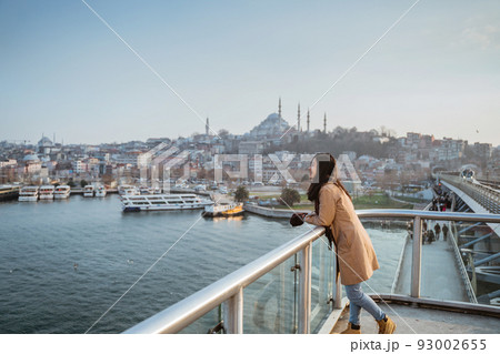 woman tourist enjoying the view of istanbul cityscape woman tourist enjoying the view of istanbul cityscape 93002655
