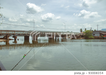 Old bridge leading to Fish Island in Kampot Cambodia Old bridge leading to Fish Island in Kampot Cambodia 93008354