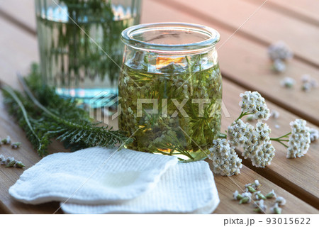Homemade Yarrow oil. DIY organic skin care cosmetic. 93015622