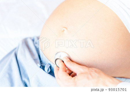 Doctor stethoscope patient pregnancy woman. Medical clinic for pregnant consultant. Doctor examining pregnancy woman belly holding stethoscope. Concept maternity, pregnancy, childbirth. Doctor stethoscope patient pregnancy woman. Medical clinic for pregnant consultant. Doctor examining pregnancy woman belly holding stethoscope. Concept maternity, pregnancy, childbirth. 93015701