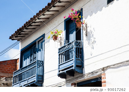 Beautiful balconies of the colonial houses at the small town of Santa Fe de Antioquia in Colombia 93017262