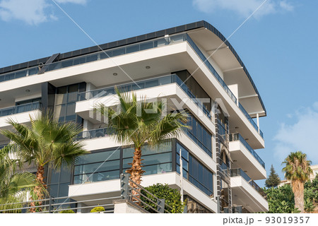 Apartment building is a new residential building in the open air. 93019357