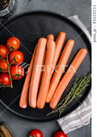Raw sausage, on gray stone table background, top view flat lay Raw sausage, on gray stone table background, top view flat lay 93020231