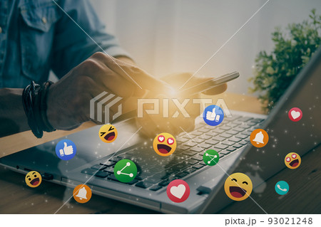 Casual Businessman Touching Mobile Phone Screen and Bottom Social Media Emoticon in Vintage Tone 93021248