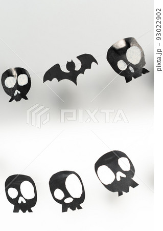 Bats and skulls black on white background, place to write greeting. Bats and skulls black on white background, place to write greeting. 93022902