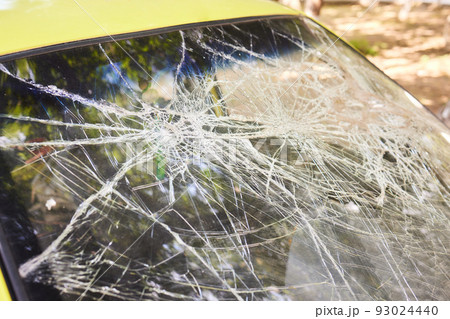 Broken glass in car. Close-Up Of Shattered Windshield. Broken glass in car. Close-Up Of Shattered Windshield. 93024440