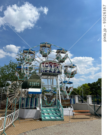 Small ferris wheel in the amusement park 93026367