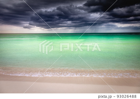 Dramatic sky over caribbean beach, Negril Seven Mile Beach, Jamaica 93026488