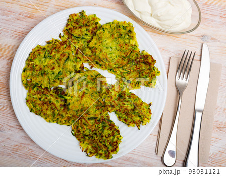 Fried zucchini fritters Fried zucchini fritters 93031121