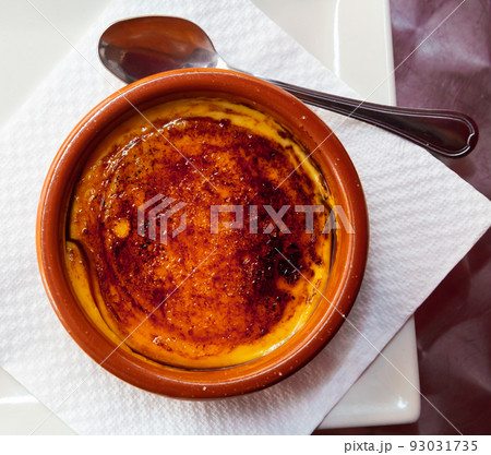 Catalan cream delicious dessert with sugar toast. Typical in Catalonia Spain 93031735