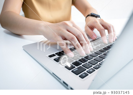 SEO Search engine optimization, Search technology, women's hands using a computer keyboard to search for information, using websites search bar to find the desired information or shopping online. SEO Search engine optimization, Search technology, women's hands using a computer keyboard to search for information, using websites search bar to find the desired information or shopping online. 93037145