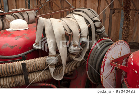 Fire hose of an old fire truck Fire hose of an old fire truck 93040433