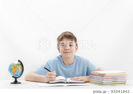 Boy of middle school does homework. Schoolboy...の写真素材 [93041842] - PIXTA