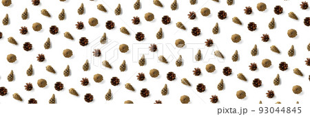 Pine cone Christmas background on white. Pine branches and cones. minimal creative cone arrangement pattern. flat lay, Modern christmas Background. Pine cone Christmas background on white. Pine branches and cones. minimal creative cone arrangement pattern. flat lay, Modern christmas Background. 93044845