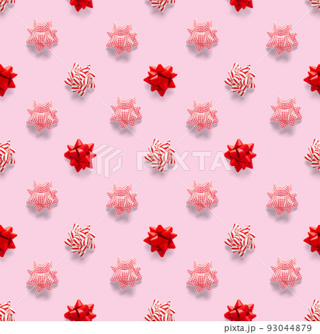 Seamless regular creative Christmas pattern with New Year decorations. xmas Modern Seamless pattern made from christmas decorations. pink background 93044879