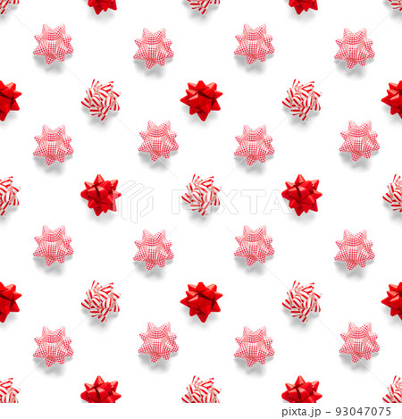 Seamless regular creative Christmas pattern with New Year decorations. xmas Modern Seamless pattern made from christmas decorations. white background Seamless regular creative Christmas pattern with New Year decorations. xmas Modern Seamless pattern made from christmas decorations. white background 93047075