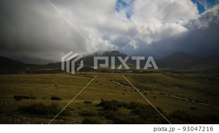 Cloudy Landscape of Mavrovo national park with mountain, FYR Macedonia Cloudy Landscape of Mavrovo national park with mountain, FYR Macedonia 93047216