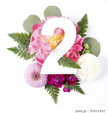 Creative layout with colorful flowers, leaves and number two isolated on white background. Creative layout with colorful flowers, leaves and number two isolated on white background. 93051842