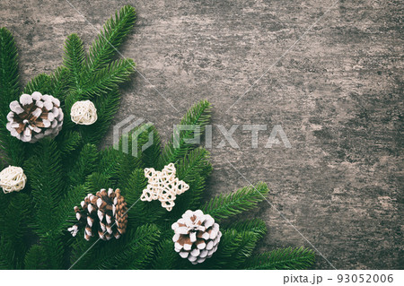 Christmas background with fir branches and Christmas decor. Top view, copy space for text Christmas background with fir branches and Christmas decor. Top view, copy space for text 93052006