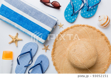 Summer vacation concept flat lay. beach accessories and towel top view. Space for text. travel concept Summer vacation concept flat lay. beach accessories and towel top view. Space for text. travel concept 93052151