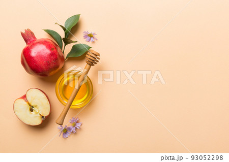 Flat lay composition with symbols jewish Rosh Hashanah holiday attributes on colored background, Rosh hashanah concept. New Year holiday Traditional. Top view with copy space 93052298