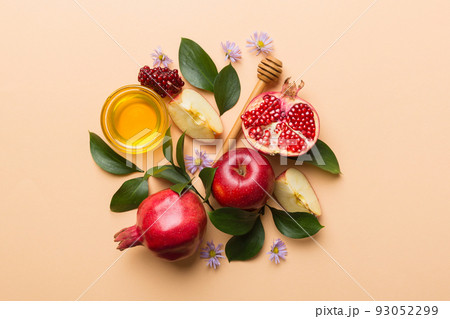 Flat lay composition with symbols jewish Rosh Hashanah holiday attributes on colored background, Rosh hashanah concept. New Year holiday Traditional. Top view with copy space Flat lay composition with symbols jewish Rosh Hashanah holiday attributes on colored background, Rosh hashanah concept. New Year holiday Traditional. Top view with copy space 93052299