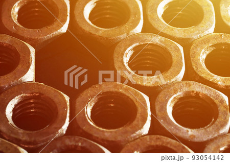 Close-up of rusty nuts Close-up of rusty nuts 93054142